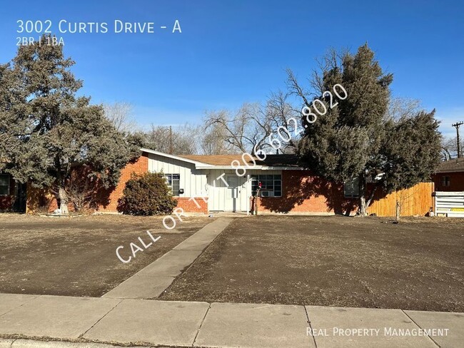 Primary Photo - Duplex on Curtis Drive