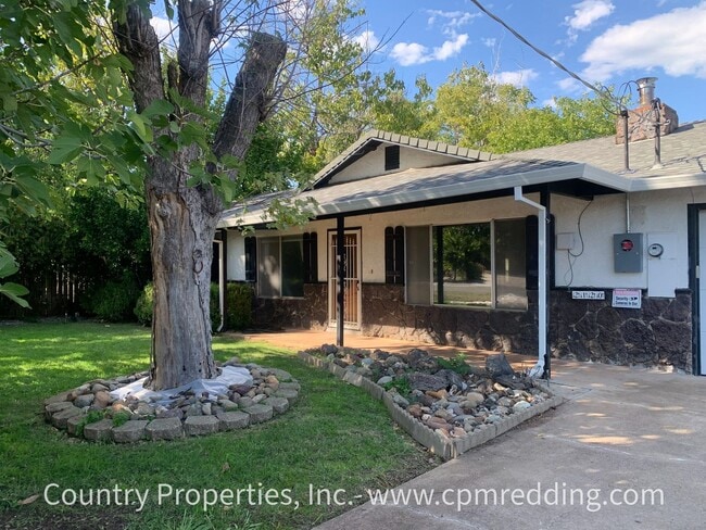 Building Photo - Price Reduced! Spacious House with Landsca...