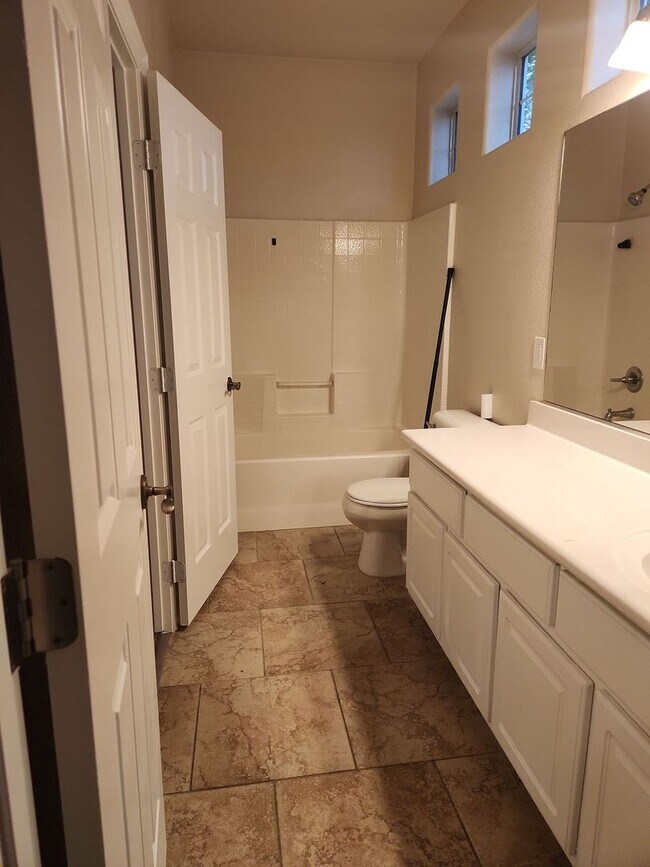 Building Photo - A Stunning 4 Bedroom Home with a Sparkling Pool