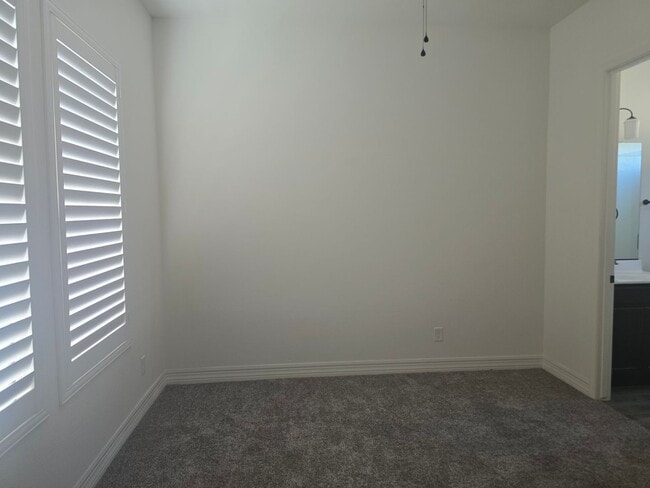 Building Photo - Five-bedroom CASITA home with a three-car ...
