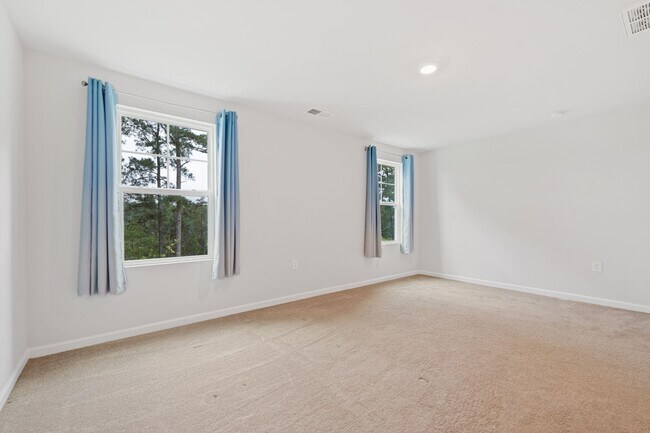 Building Photo - Charming 3-bedroom, 3.5-bathroom townhouse located in the heart of Durham, NC!
