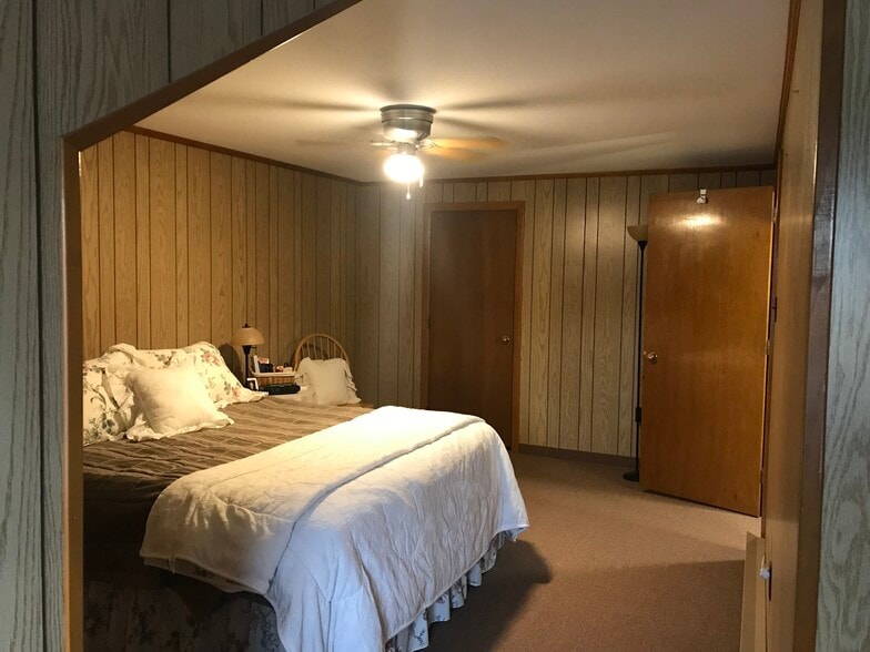 Bedroom 1 with Ceiling fan and walk in closet - 38 Highland St