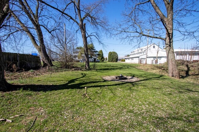 Building Photo - Four Bedroom Single-Family Home