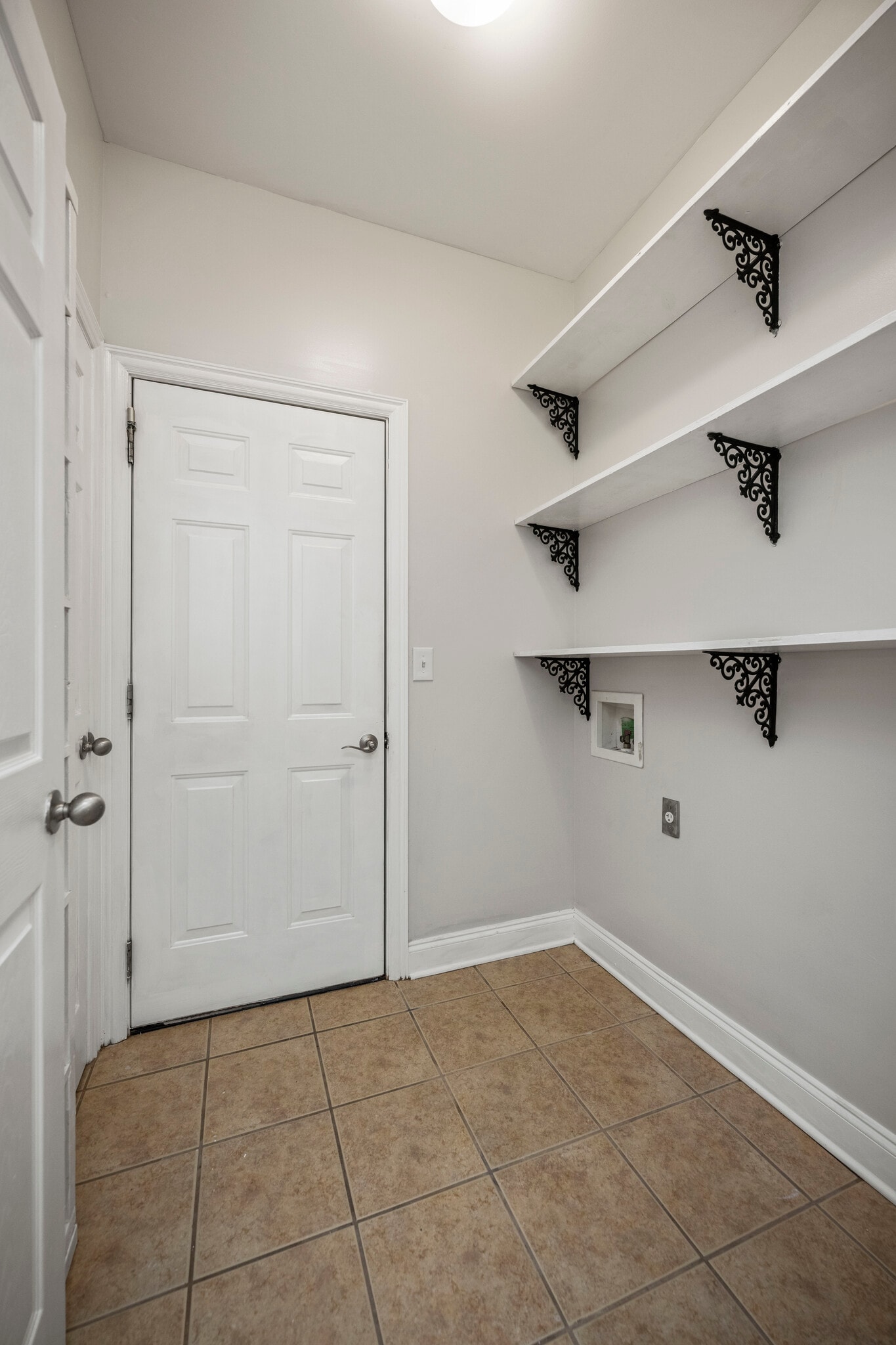 First Floor - Utility Room with washer and Dryer Hookup with Garage Door entrance - 393 Hays Blvd
