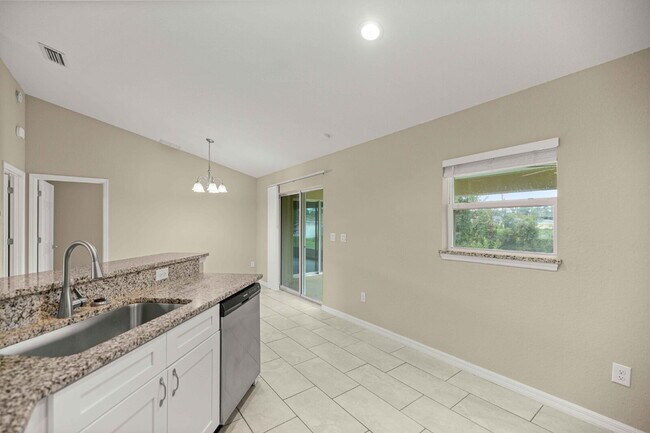 Building Photo - Newer 3BR Home on Nearly 1/4 Acre | Screened Lanai | Available Now!