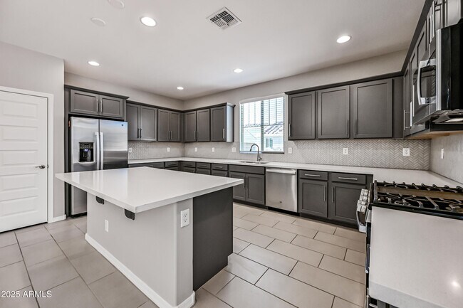 Building Photo - 3817 N 100th Dr