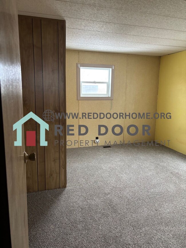 Building Photo - Three-Bedroom Double Wide with Fenced Yard