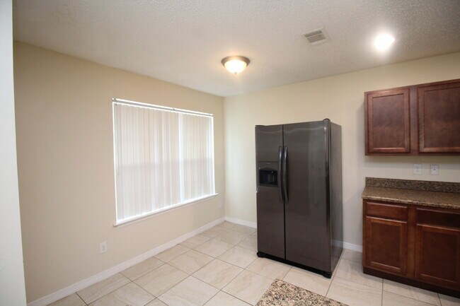 Building Photo - West Pensacola Duplex Living — 3BR Home with Open Floor Plan, Eat-In Kitchen, Covered Patio & Low...