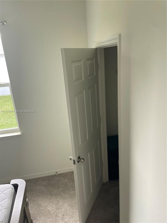 Building Photo - 6157 NW Gatun Dr