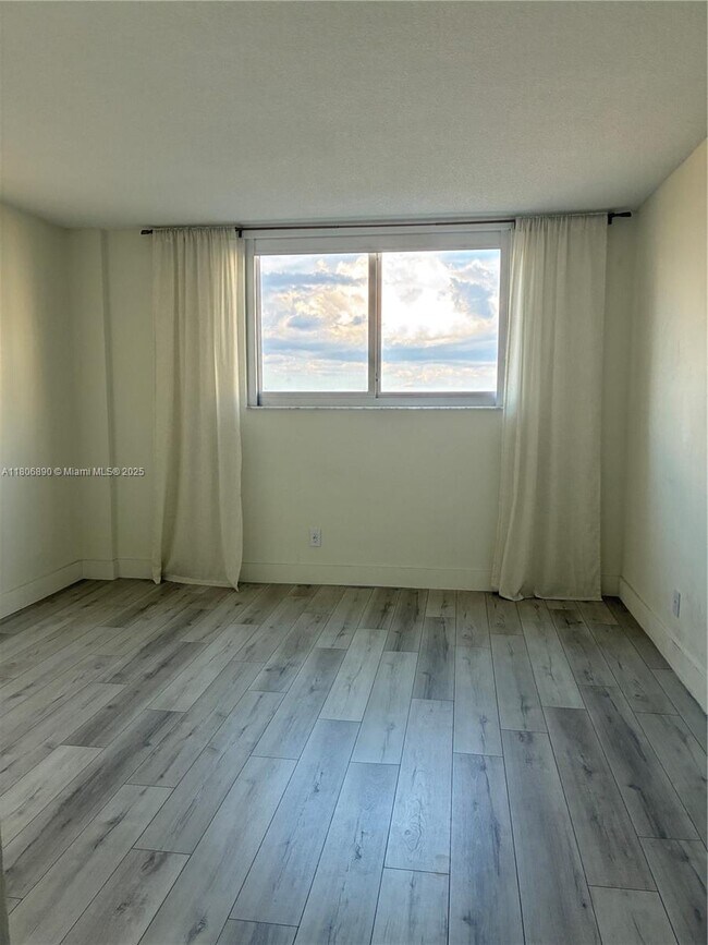Building Photo - 19380 Collins Ave