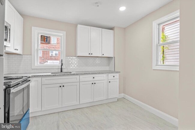 Building Photo - 7010 Cedar Park Ave