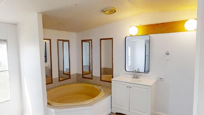 Building Photo - "Charming 3-Bed, 2-Bath Mobile Home Retrea...