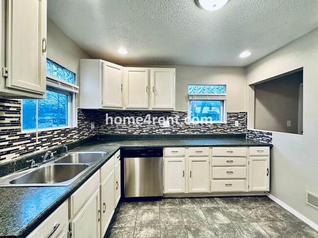 Building Photo - Adorable Home Featuring Wood Floors, SS Ap...