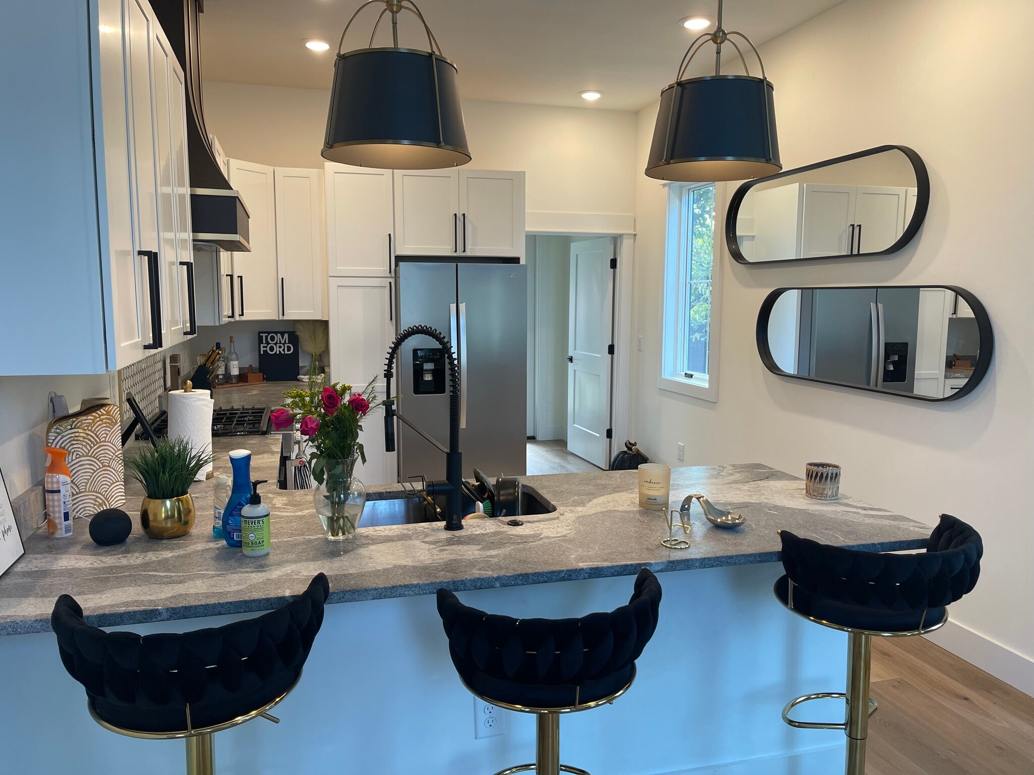 Kitchen with Laundry and back door toward the back. - 2312 Island Home Ave