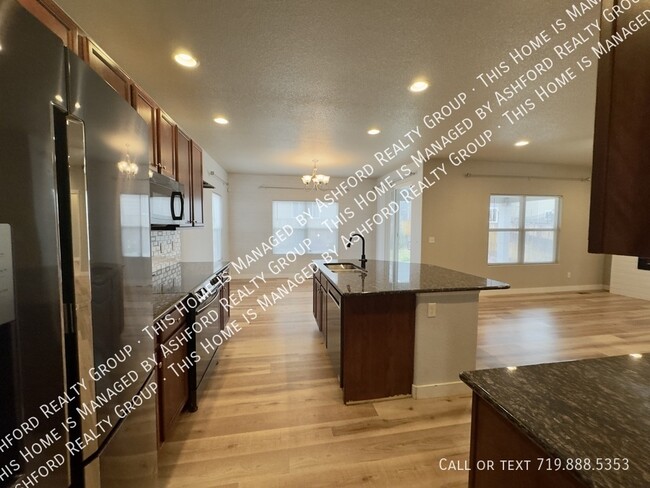 Building Photo - 7772 Wagonwood Pl