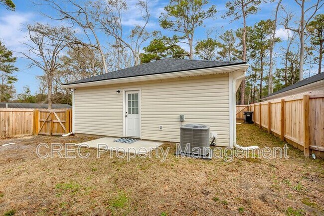 Building Photo - 6961 Raymond Ave