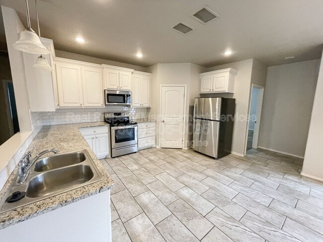 Building Photo - 11207 Akron Ave