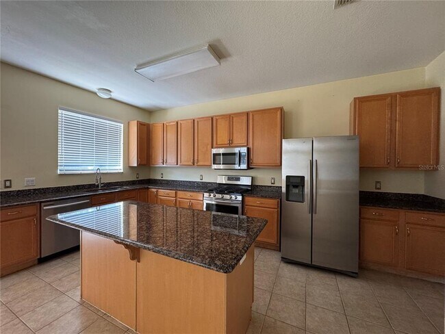 Building Photo - 6767 Waterton Dr