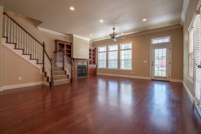 Building Photo - Luxurious Executive Row House in Northeast Fayetteville! Lawn care included!
