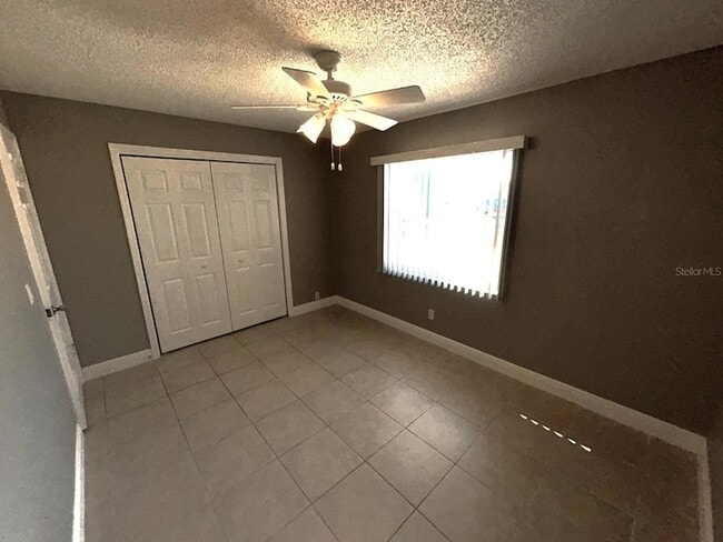 Building Photo - 6525 Manila Palm Way