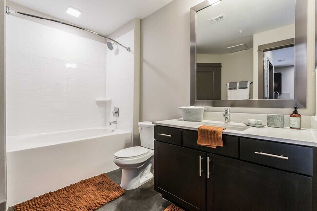 Building Photo - Your Downtown Lifestyle Begins Now