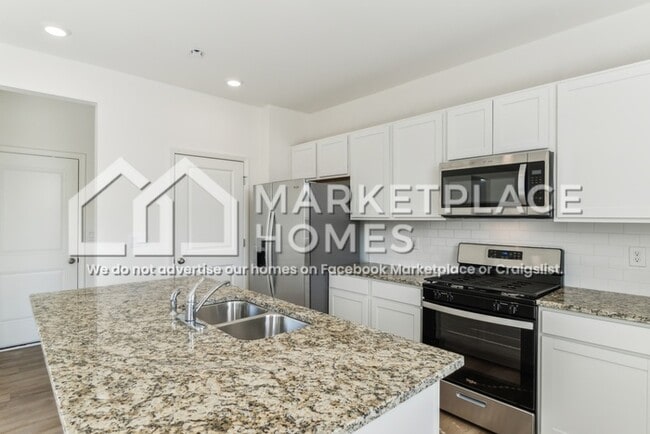 Building Photo - 7123 Train Station Way