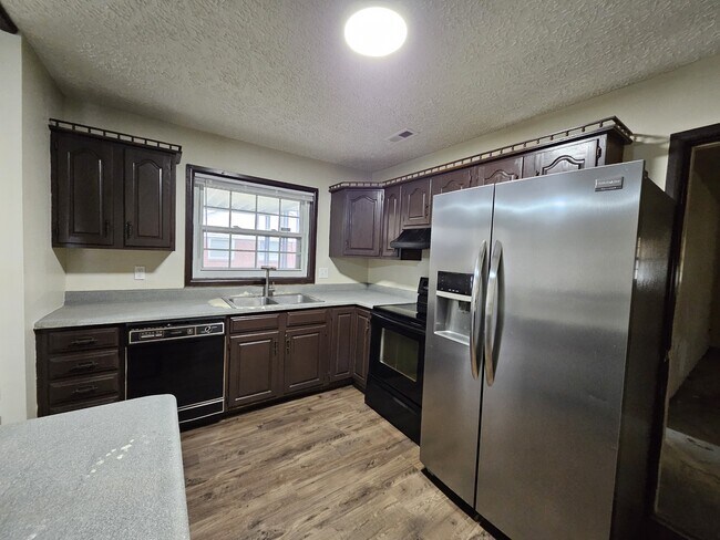 Building Photo - 3403 N Hartman Dr