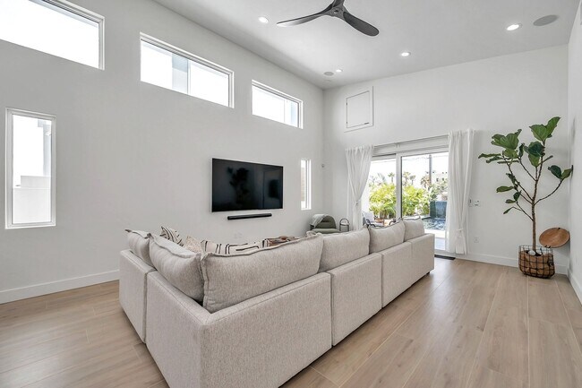 Building Photo - Luxury Living in Grand Central District: Exquisite Furnished Home with Pool