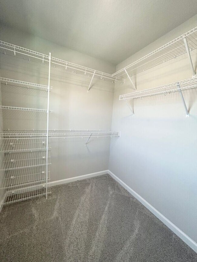 Building Photo - Brand-New 3/3 Modern Townhome in Gated Tys...