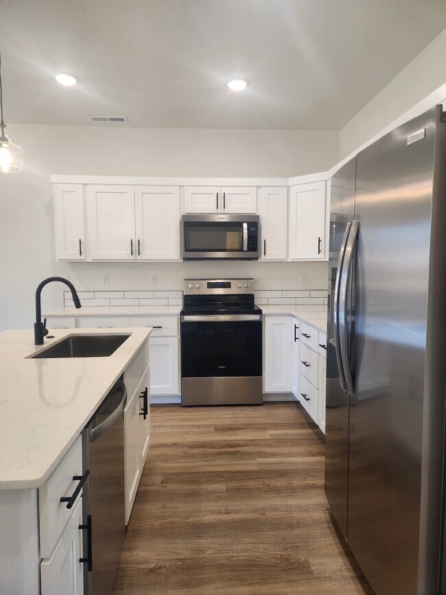 Building Photo - "Modern Comfort Awaits: Spacious and NEW 3-Bed Townhouse Available June 1st!