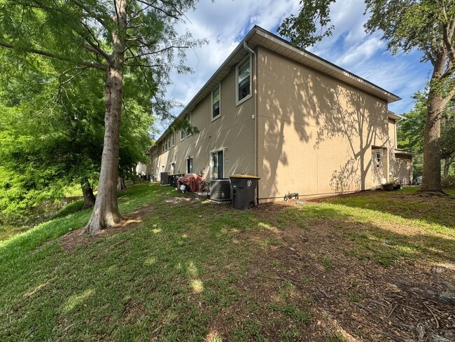 Building Photo - Available Now! Westside Timothy's Landing 2/2.5 Townhome with a 1-Car Garage