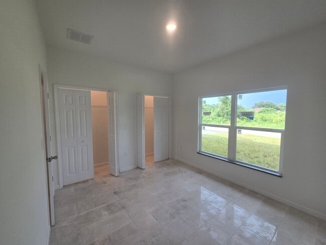 Building Photo - Brand New 2/2/1- SW Lehigh Acres