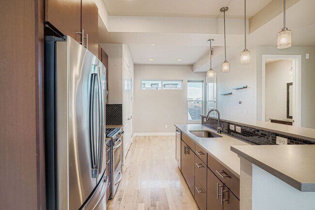 Building Photo - Views for Days! Rooftop Retreat Near Sloan...