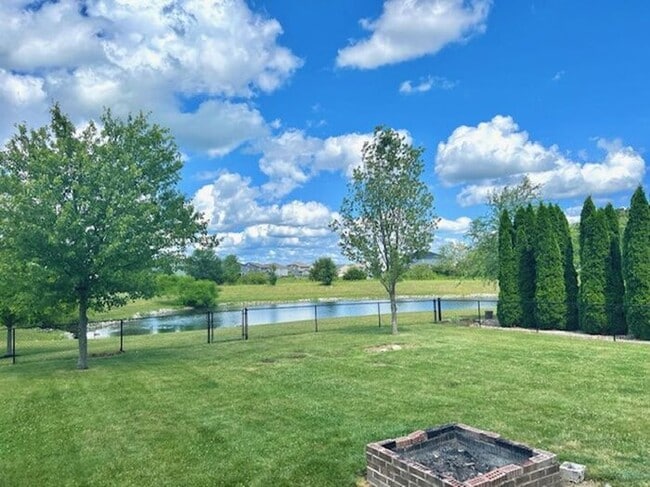 Building Photo - 4 Bedroom Home With Pond View in Top Rated...