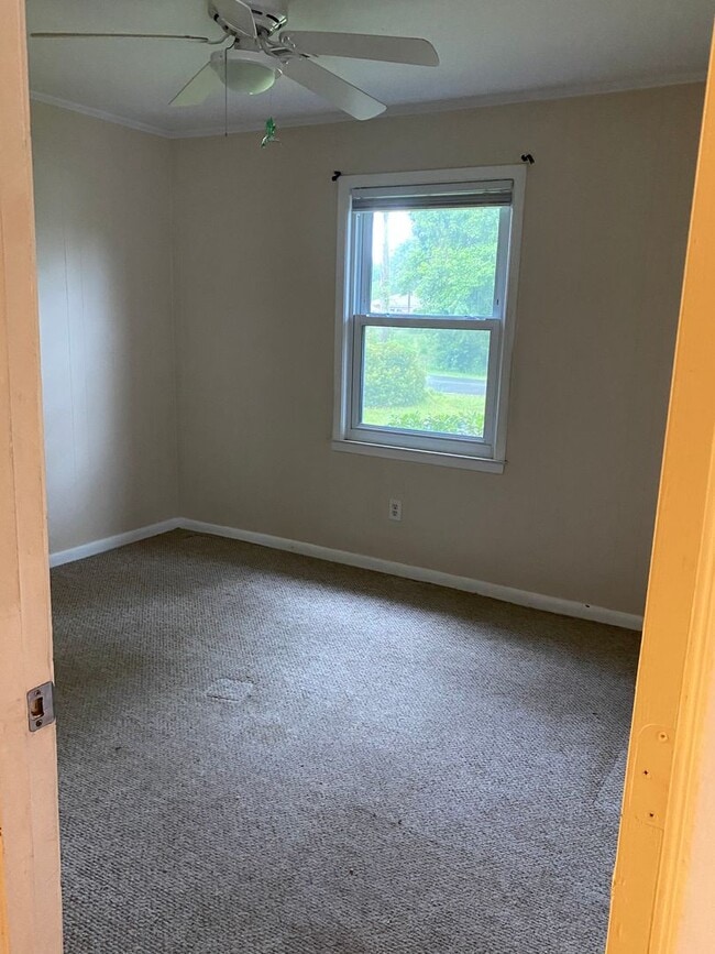 Building Photo - COMING SOON! 4Br, 2.5 baths, large kitchen, large bedrooms, fence, storage and more! N. College R...