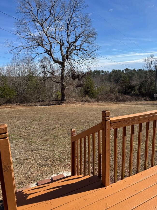 Building Photo - Spacious 4-Bedroom Rural Home on Private Acreage