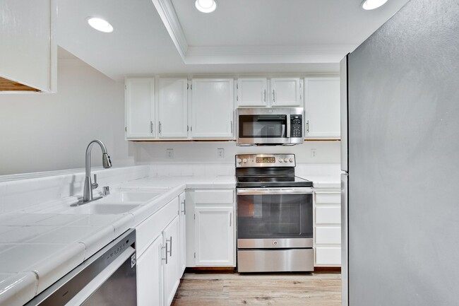 Building Photo - Hidden Silicon Valley Oasis! 2BR/2.5BA Townhome with TWO Private Patios, 2 Dedicated Parking Spac...
