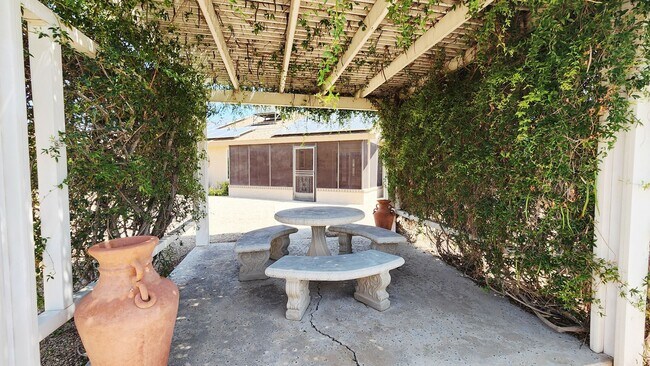 Building Photo - 55+ Gorgeous Gem Furnished ready for Move in!