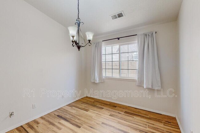 Building Photo - 5551 Rabadi Castle Ave NW