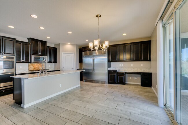 Building Photo - Beautiful Next-Gen Home with Private Entry Suite & Spacious Backyard