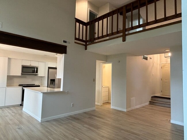 Building Photo - Charming Condo in a Can't-Miss Location – Private Deck, Garage, and Nature-Filled Community