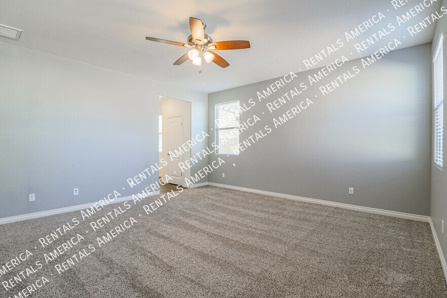 Building Photo - 10910 E Calypso Ave