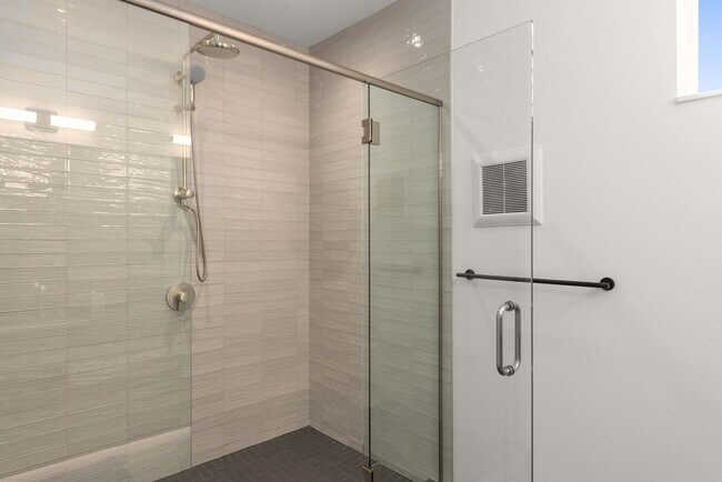Building Photo - Stunning remodeled apartment with large walk-out patio