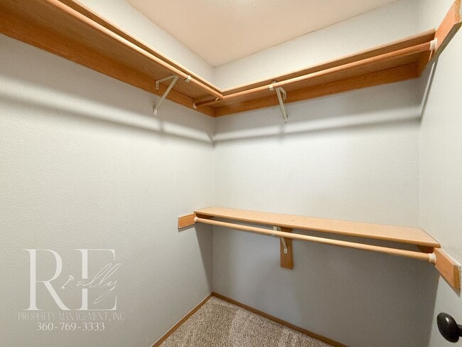 Building Photo - Vaulted Ceilings, Skylights & a True Primary Suite in This Gig Harbor Duplex