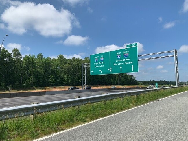 Building Photo - McLeansville - Minutes from Elon & Greensboro! Few Acres, Brick Duplex, Just Painted, New Carpet,...