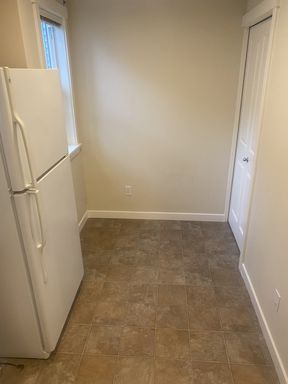 Building Photo - LIKE NEW three bedroom with fantastic updates, one car garage and private newly fenced front patio!