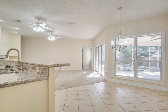 Building Photo - Festive Move-In Special! 4BR/3BA Lenox Gem – Fully Fenced Backyard & Military ½ Deposit