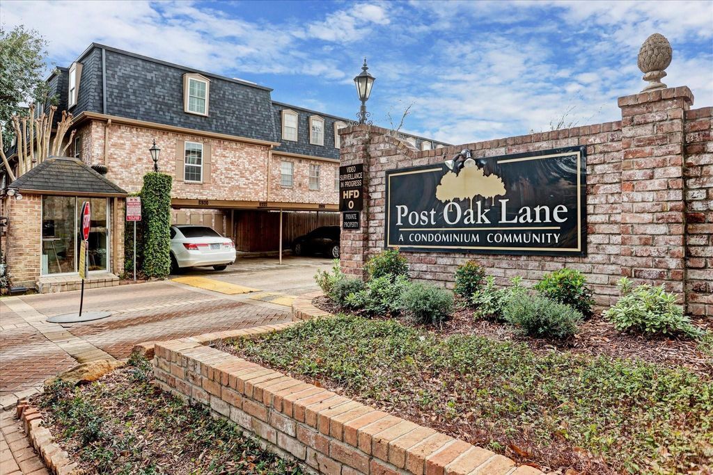 Dedicated carport and secure access gates. - 353 N Post Oak Ln