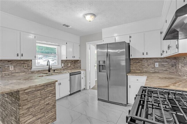 Building Photo - 4906 Wolverton Dr
