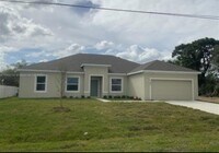 Building Photo - 1142 SW Edinburgh Dr